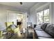 Cozy living area with comfortable seating and a view of the backyard at 531 E Lynwood St, Phoenix, AZ 85004