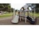 Modern playground with slide and climbing structures at 5414 E Glade Ave, Mesa, AZ 85206