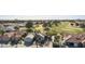 Aerial view of single-story home with golf course views at 563 W Champagne Dr, Chandler, AZ 85248