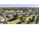 Wide aerial view of a community near a golf course at 563 W Champagne Dr, Chandler, AZ 85248