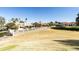 Home's backyard with a golf course view at 563 W Champagne Dr, Chandler, AZ 85248