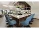 Modern bar with comfortable seating and multiple TVs at 563 W Champagne Dr, Chandler, AZ 85248