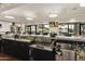 Modern bar with drink taps, shelving, and a full array of liquor at 563 W Champagne Dr, Chandler, AZ 85248