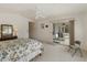 Bright bedroom with sliding glass doors leading to patio at 563 W Champagne Dr, Chandler, AZ 85248