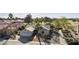 Single story home with a two car garage and landscaped yard at 563 W Champagne Dr, Chandler, AZ 85248