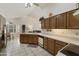 Spacious kitchen with island and breakfast nook at 563 W Champagne Dr, Chandler, AZ 85248