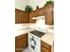 View of kitchen stove, cabinets, and countertops at 563 W Champagne Dr, Chandler, AZ 85248