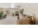 Spacious living room featuring a fireplace and large windows at 563 W Champagne Dr, Chandler, AZ 85248