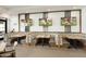 Modern restaurant with booths and multiple TVs at 563 W Champagne Dr, Chandler, AZ 85248