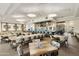 Modern restaurant with tables and chairs, multiple TVs at 563 W Champagne Dr, Chandler, AZ 85248