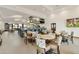 Bright, spacious restaurant with bar and multiple TVs at 563 W Champagne Dr, Chandler, AZ 85248