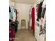 Spacious walk-in closet with ample shelving and hanging space at 563 W Champagne Dr, Chandler, AZ 85248