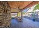 Covered patio with brick flooring and ceiling fan at 7318 W Jones Ave, Phoenix, AZ 85043