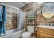 Clean bathroom with tile shower and modern vanity at 7318 W Jones Ave, Phoenix, AZ 85043