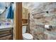 Clean bathroom with tile shower and modern vanity at 7318 W Jones Ave, Phoenix, AZ 85043