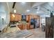 Modern kitchen with granite countertops, wooden cabinets, and black appliances at 7318 W Jones Ave, Phoenix, AZ 85043