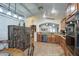 Open concept kitchen boasting stainless steel appliances and granite countertops at 7318 W Jones Ave, Phoenix, AZ 85043