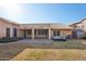 Home exterior showcasing a covered patio and hot tub at 7869 W Kristal Way, Glendale, AZ 85308