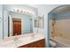 Bathroom with double sinks, tub, and shower at 7869 W Kristal Way, Glendale, AZ 85308