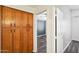 Bedroom with wood cabinets and vinyl flooring at 7869 W Kristal Way, Glendale, AZ 85308