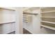 Large walk-in closet with ample shelving and hanging space at 7869 W Kristal Way, Glendale, AZ 85308