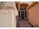 Home features an inviting entryway with a brick walkway at 7869 W Kristal Way, Glendale, AZ 85308