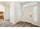 Bright entryway with neutral walls and hardwood floors at 7869 W Kristal Way, Glendale, AZ 85308