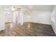 Bright and airy entryway with hardwood floors and views to other rooms at 7869 W Kristal Way, Glendale, AZ 85308