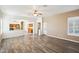 Bright and airy living room with hardwood floors and neutral walls at 7869 W Kristal Way, Glendale, AZ 85308