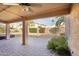 Covered patio with brick pavers and views of the backyard at 7869 W Kristal Way, Glendale, AZ 85308