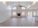 Spacious living room featuring hardwood floors and a fireplace at 818 W Allen St, Phoenix, AZ 85041