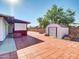 Backyard view showcasing storage shed and patio area at 10329 W Griswold Rd, Peoria, AZ 85345