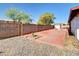 Large backyard with gravel and a small garden area at 10329 W Griswold Rd, Peoria, AZ 85345