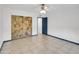 Bedroom with painted closet doors and ceiling fan at 10329 W Griswold Rd, Peoria, AZ 85345