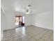 Bedroom with sliding glass door to patio at 10329 W Griswold Rd, Peoria, AZ 85345