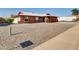 House exterior showcasing landscaping and a gravel driveway at 10329 W Griswold Rd, Peoria, AZ 85345