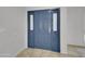 Solid blue front door with sidelights at 10329 W Griswold Rd, Peoria, AZ 85345