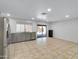 Kitchen with stainless steel appliances and gray cabinets at 10329 W Griswold Rd, Peoria, AZ 85345