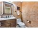 Elegant bathroom with marble vanity and textured walls at 11022 N Indigo Dr # 127, Fountain Hills, AZ 85268