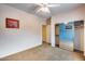 Bedroom with mirrored closet doors and ceiling fan at 11022 N Indigo Dr # 127, Fountain Hills, AZ 85268