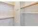 Large closet with shelves and hanging rods at 11022 N Indigo Dr # 127, Fountain Hills, AZ 85268