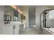 Bathroom featuring dual sinks, vanity area, and contemporary finishes at 11453 E Utah Ave, Mesa, AZ 85212