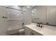 Bright bathroom featuring modern black fixtures and subway tile shower at 11453 E Utah Ave, Mesa, AZ 85212