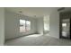 Spacious main bedroom with a large window providing natural light and neutral color palette at 11453 E Utah Ave, Mesa, AZ 85212