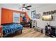 Game-themed bedroom with a large TV and gaming setup at 12053 N 157Th Ave, Surprise, AZ 85379