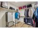 Large walk-in closet with ample shelving and hanging space at 12053 N 157Th Ave, Surprise, AZ 85379