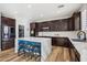 Modern kitchen with an island, quartz countertops, and stainless steel appliances at 12053 N 157Th Ave, Surprise, AZ 85379