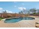 Inviting kidney-shaped pool with waterfall feature at 12053 N 157Th Ave, Surprise, AZ 85379