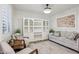 Cozy sitting room featuring a built-in shelving unit and comfortable seating at 12053 N 157Th Ave, Surprise, AZ 85379