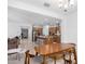 Open concept dining area with wood table and chairs, overlooking the kitchen at 12105 W Luxton Ln, Avondale, AZ 85323